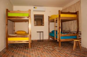 Postel nebo postele na pokoji v ubytování Casa Arev