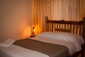Postel nebo postele na pokoji v ubytování Casa Arev