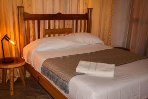 Postel nebo postele na pokoji v ubytování Casa Arev