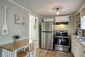 a kitchen with a stainless steel refrigerator and a counter at Pura Vida - B -Murrells Inlet in Myrtle Beach