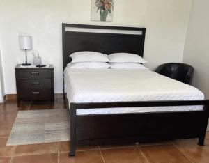 Łóżko lub łóżka w pokoju w obiekcie Cozy Rooms