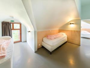 Postel nebo postele na pokoji v ubytování Holiday Home in Durbuy near Adventure Valley