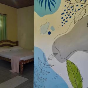 A bed or beds in a room at Casa Vida Doce