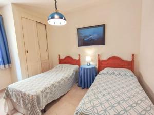 Posteľ alebo postele v izbe v ubytovaní Spacious 4 bedroom with parking in town centre, Nerja