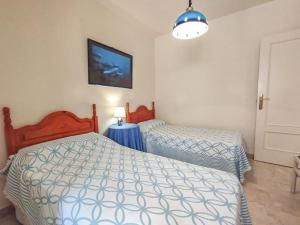 Posteľ alebo postele v izbe v ubytovaní Spacious 4 bedroom with parking in town centre, Nerja