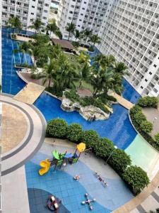 a model of a resort with a swimming pool at 1 bedroom unit condo in Manila