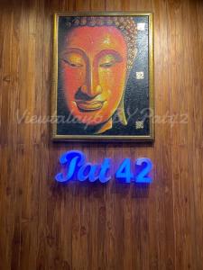 a picture of a painting of a face on a wall at View Talay 6 by Pat 42 in Pattaya