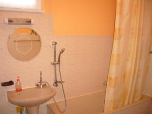 Kúpeľňa v ubytovaní Ország Apartmanház