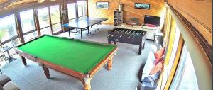 a room with a pool table in a house at 15 Whitecrest Great Ocean Road Resort - Ocean View in Apollo Bay