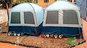 a tent with a row of ducks in front of it at Zions Camping sight in Srinagar