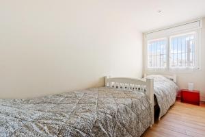 Säng eller sängar i ett rum på Apartamento Welcs EMP 074 en el Puerto