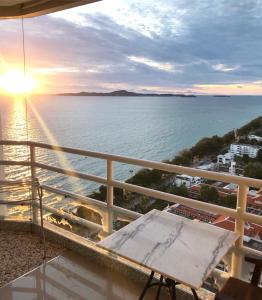 a view of the ocean from the balcony of a condo at View Talay Condominium by Vlad Property in Pattaya South