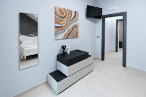 TV a/nebo společenská místnost v ubytování iitana Luxury Apartment - Catania Fronte Mare