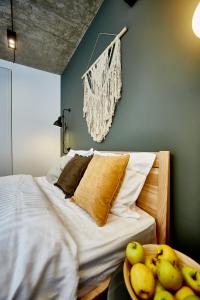 Llit o llits en una habitació de City Rooms Arcadia Self Check-In