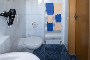 Koupelna v ubytování Gästehaus Kölfhamm 2
