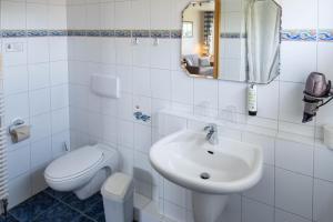 Koupelna v ubytování Gästehaus Kölfhamm 2