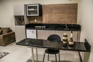 Kuchyň nebo kuchyňský kout v ubytování Blu Apart Hotel