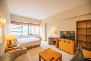 TV a/nebo společenská místnost v ubytování Shanghai Centre Serviced Apartment