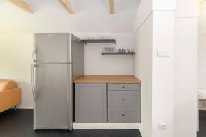 Η κουζίνα ή μικρή κουζίνα στο Appleby Apartments Kersnik +36 φωτογραφίες