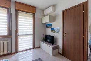 TV a/nebo společenská místnost v ubytování Casa vacanze- Debra