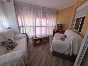 Telewizja i/lub zestaw kina domowego w obiekcie Apartamento Maysan IF Benidorm