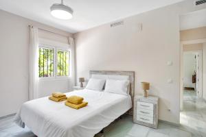 Postel nebo postele na pokoji v ubytování N07 Cabopino + 37 fotografií