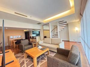 Posezení v ubytování Shanghai Centre Serviced Apartment