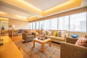Posezení v ubytování Shanghai Centre Serviced Apartment