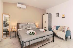 Posezení v ubytování Fay's Suites
