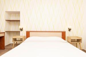 Postel nebo postele na pokoji v ubytování Apartments Dominik