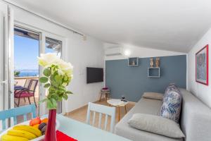 TV a/nebo společenská místnost v ubytování Apartments Tamaris
