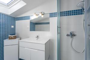 Koupelna v ubytování Apartments Tamaris + 27 fotografií