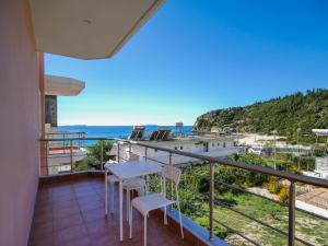 a balcony with a view of the ocean at Himara Royal Hotel in Himare