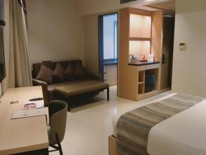 Letto o letti in una camera di Click Hotel Bangalore - International Airport