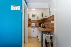 Kuchyň nebo kuchyňský kout v ubytování Apartments Tamaris