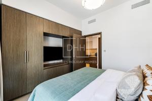 Postel nebo postele na pokoji v ubytování Gorgeous 1 Bed Family Suite, Burj Royale Near To Dubai Mall