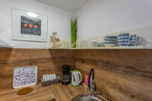 Kuchyň nebo kuchyňský kout v ubytování Apartments Tamaris
