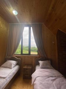 Postel nebo postele na pokoji v ubytování Kirta