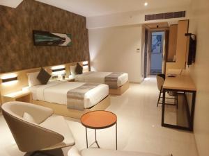 Postel nebo postele na pokoji v ubytování Click Hotel Bangalore - International Airport + 37 fotografií