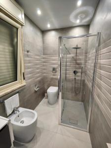 A bathroom at Dependance La Mouette