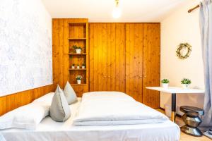 Postel nebo postele na pokoji v ubytování Sleep In Venzone