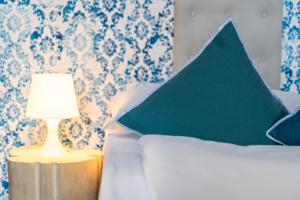 Postel nebo postele na pokoji v ubytování Sleep In Venzone
