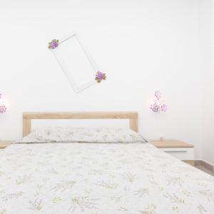 Postel nebo postele na pokoji v ubytování Apartments Dominik