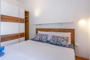 Postel nebo postele na pokoji v ubytování Apartments Tamaris