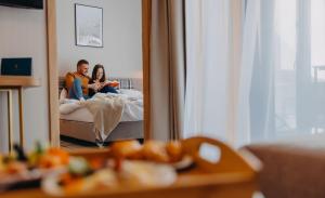 Posteľ alebo postele v izbe v ubytovaní Green Adults