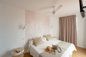 Postel nebo postele na pokoji v ubytování Hotel Internacional