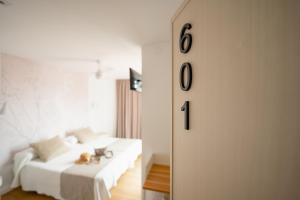 Postel nebo postele na pokoji v ubytování Hotel Internacional