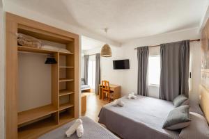 Postel nebo postele na pokoji v ubytování Hotel Internacional