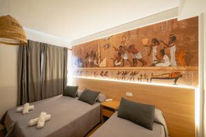 Postel nebo postele na pokoji v ubytování Hotel Internacional