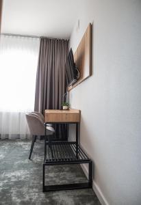 TV a/nebo společenská místnost v ubytování Hotel Tomas